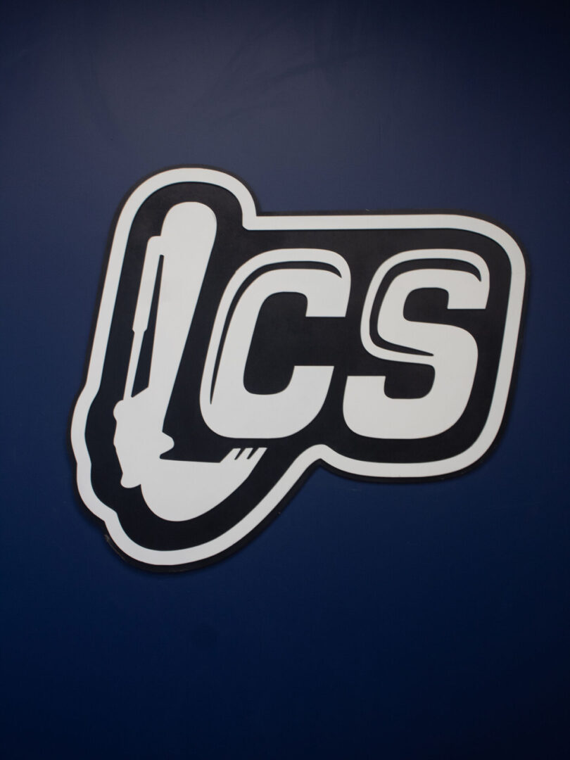 Logo with letters 'ICS' and a stylized pipe or tool graphic.